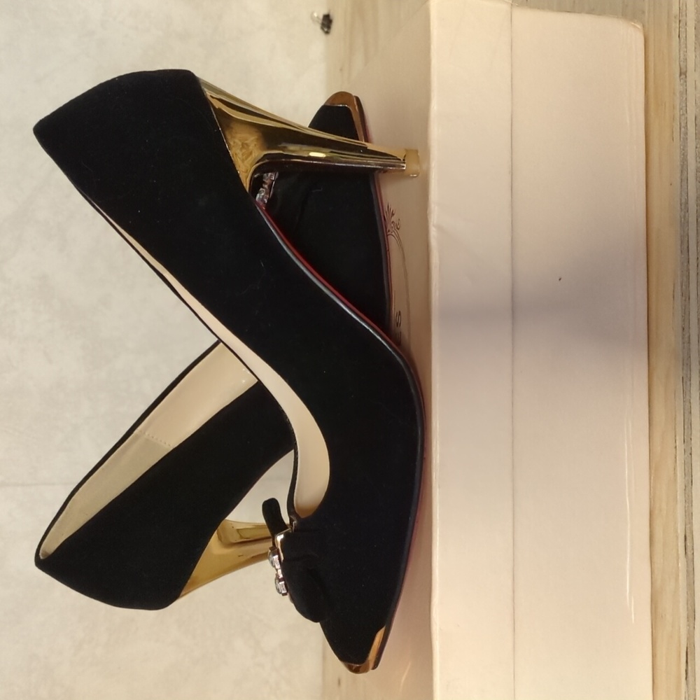 high heel shoe in black suede